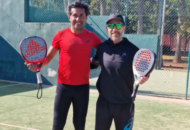 Two padel players on a court